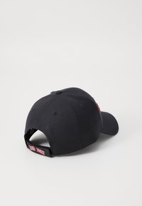 Navy blue baseball cap made of durable fabric with a curved brim. Rear features a black strap with "RED SOX" in red embroidery.