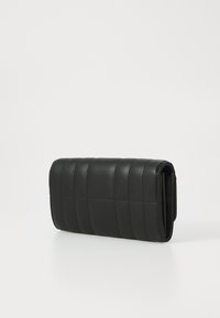 Black leather wallet with a quilted pattern, rectangular shape, and a smooth texture; features a fold-over flap and stitching details.