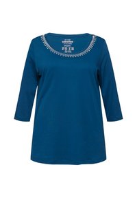 T-shirt a maniche lunghe, blu navy con scollatura rotonda decorata con perline argentate. Tessuto morbido, vestibilità comoda e lunghezza sotto l'anca.
