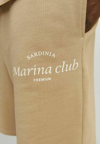 Jack & Jones PREMIUM Pantaloni sportivi - beige