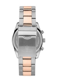 Bracelet de montre en acier inoxydable avec des accents en or rose, présentant une finition brossée et des maillons polis. Sécurisé par un fermoir, logo gravé au dos.