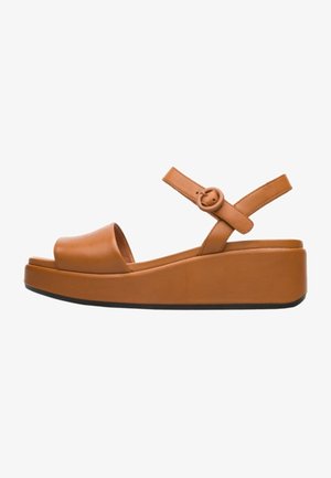 Brune læder wedge sandaler med rund tå, justerbar ankelrem og en tyk, tekstureret platformssål.