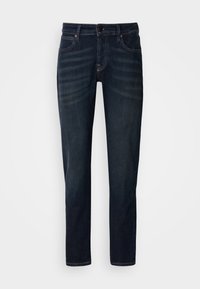 Jeans din denim albastru închis cu croială dreaptă, având închidere cu nasture, design cu cinci buzunare și decolorare subtilă pe coapse.