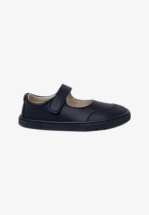 Chaussure Mary Jane en cuir noir avec bride en Velcro, doublure intérieure beige et semelle en caoutchouc, conçue pour enfants.