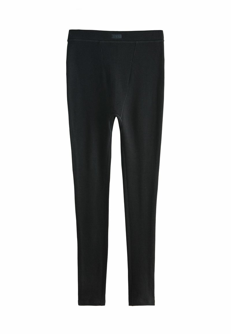Leggings negros con una textura acanalada, que cuentan con una amplia cintura elástica y un diseño ajustado, que se estrecha en el tobillo.