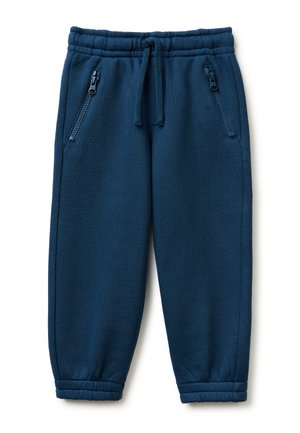 Pantaloni jogger in pile blu navy con vita elasticizzata, coulisse, tasche laterali con zip e polsini elastici.