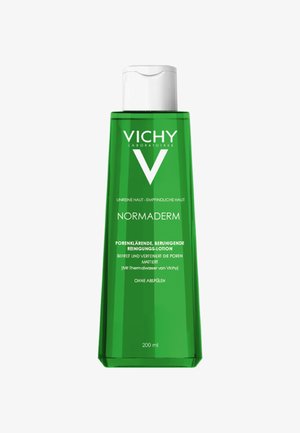 Grüne Plastikflasche mit Vichy Normaderm Reinigungsfluid, ausgestattet mit einem Pumpkopf, minimalistisches Design und bedrucktem Text auf der Vorderseite, 200 ml.