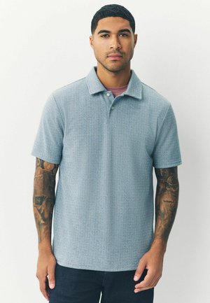 - Koszulka polo