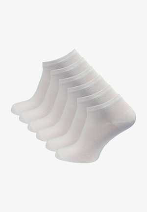 Five pairs of ankle socks, white with a soft knit texture, ribbed cuffs, and reinforced heels, displayed in a staggered arrangement.