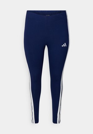 Mørkeblå leggings med en jevn tekstur, preget av hvite side-striper og en Adidas-logo på venstre lår. Elastisk midjebånd for komfort.