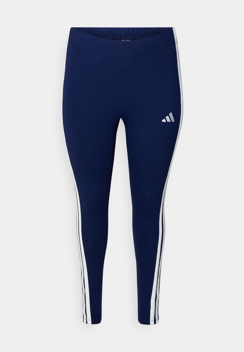 Námornícke modré legíny s hladkou textúrou, s bielymi bočnými pruhmi a logom Adidas na ľavom stehne. Elastický pás pre pohodlie.