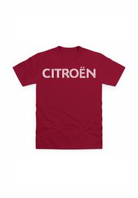 Červené bavlněné tričko s velkým bílým logem "CITROËN" v tučném, moderním písmu přes hrudník. Krátké rukávy a volný střih.
