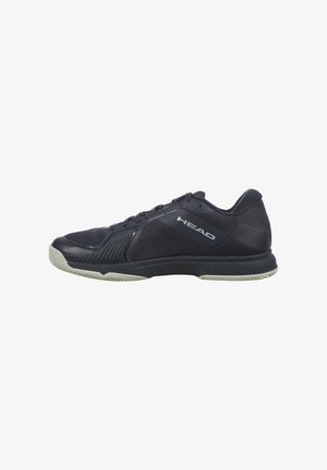 Zapatilla deportiva de corte bajo en negro y gris con parte superior de malla, cordones y suela texturizada de color claro, con la marca "HEAD" en el costado.