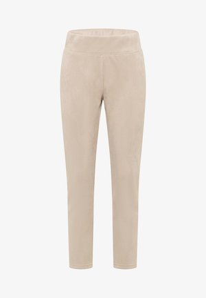 Beiga leggings tillverkade av mjukt, strukturerat tyg med hög midja och avsmalnande benform, med mjuka sömmar och ingen synlig hårdvara.