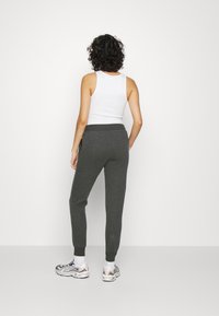 Ellesse HALLOULI PANT - Treningo apatinė dalis - dark grey marl