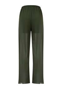 Pantalon ample vert foncé transparent avec taille élastique, montré de dos sur fond blanc.