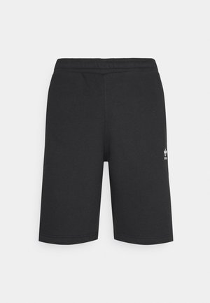 Czarne krótkie spodenki do kolan z elastycznym pasem i małym białym logo Adidas na prawej udzie, przedstawione na jednolitym tle.