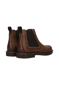 Braune Leder Chelsea-Boots mit elastischen Seitenpaneelen, genähten Details und Zugschlaufen. Ausgestattet mit einer strukturierten Gummisohle für besseren Grip.