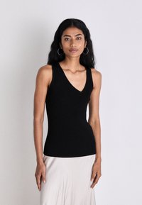 HUGO SHARPIN - Top - black