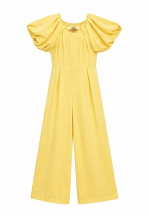 Tuta gialla a gamba larga con maniche corte arricciate e scollo a goccia con una piccola chiusura a clip.