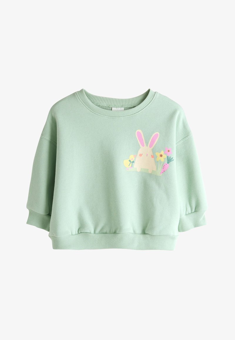 Sweat-shirt court vert clair avec poignets et ourlet côtelés, avec un lapin, un poussin, des fleurs et une carotte dessinés sur le devant à droite.