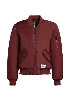 Burgunderfarbene Bomberjacke mit Reißverschluss vorne, gerippten Bündchen und Saum, zwei Fronttaschen und einer Reißverschlusstasche am linken Ärmel. Glattes, glänzendes Material.