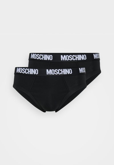 Boxer em algodão preto com uma faixa na cintura com o logótipo branco da Moschino. Apresenta uma textura suave e um corte clássico com frente em dupla camada para suporte.