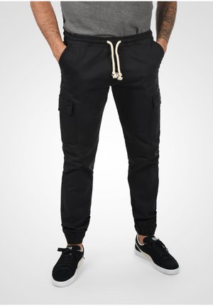 IDABBAL - Cargo trousers - black