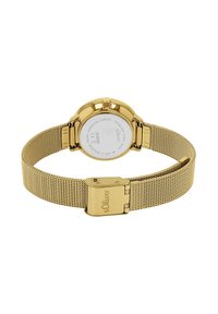 Goldfarbene Edelstahl-Uhr mit einem Mesh-Armband, rundem Gehäuse und einem Verschluss. Auf der Rückseite sind die Wasserdichtigkeitsdetails und der Markenname abgebildet.