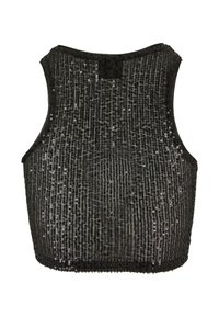Haut court noir sans manches recouvert de rangées verticales de sequins noirs brillants sur fond blanc.