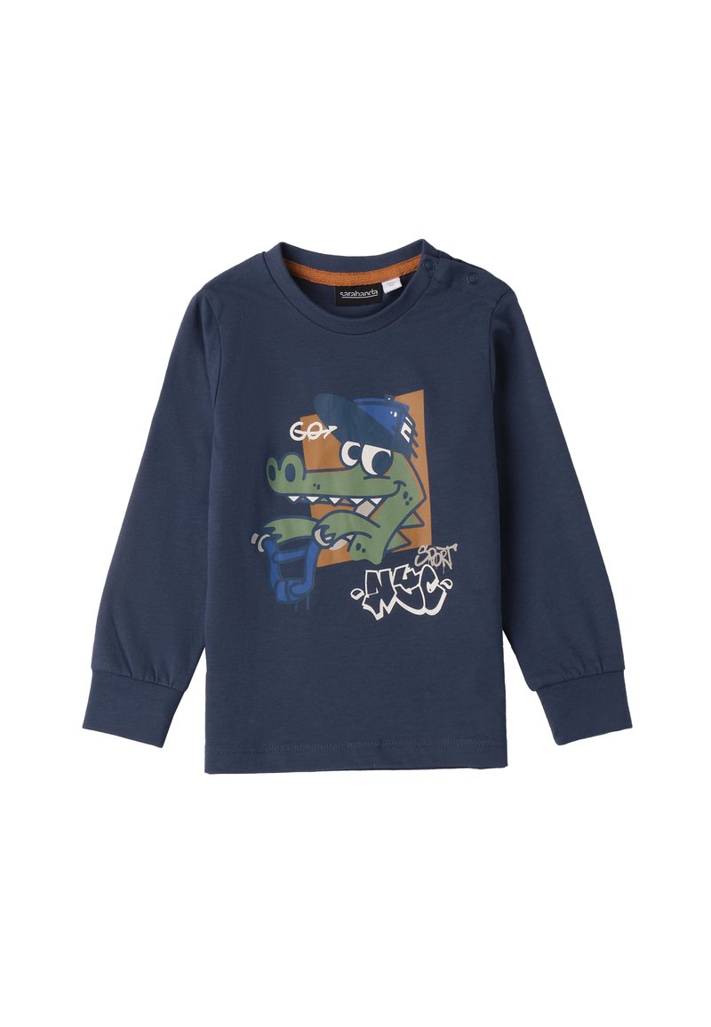 Langärmliges T-Shirt aus navy-blauem Baumwollstoff mit einem Cartoon-Krokodil-Motiv, das eine blaue Mütze trägt, sowie Graffiti-Schriftzug in Weiß und grünen Akzenten.