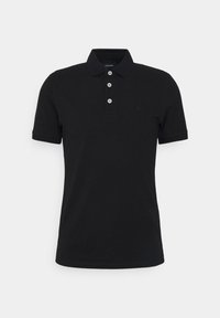 Polo noir à manches courtes avec trois boutons blancs et un col plié, présenté sur un fond gris clair uni.