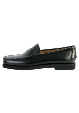 Mocasines de cuero negro con un acabado suave, con costuras alrededor del dedo del pie y una suela de goma. Diseño clásico con un perfil bajo.