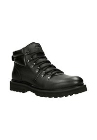 Stivale da trekking in pelle nera con finitura testurizzata, occhielli in metallo e suola in gomma resistente. Presenta un colletto imbottito e un sistema di allacciatura.