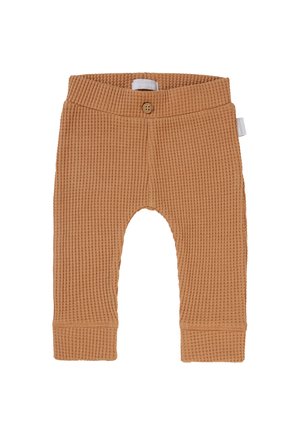 Babyhose aus leicht braunem, waffle-texturiertem Stoff mit elastischem Bund und einem einzelnen Knopfdetail. Eng anliegende Bündchen an den Knöcheln. Aus weichem Baumwollmaterial.