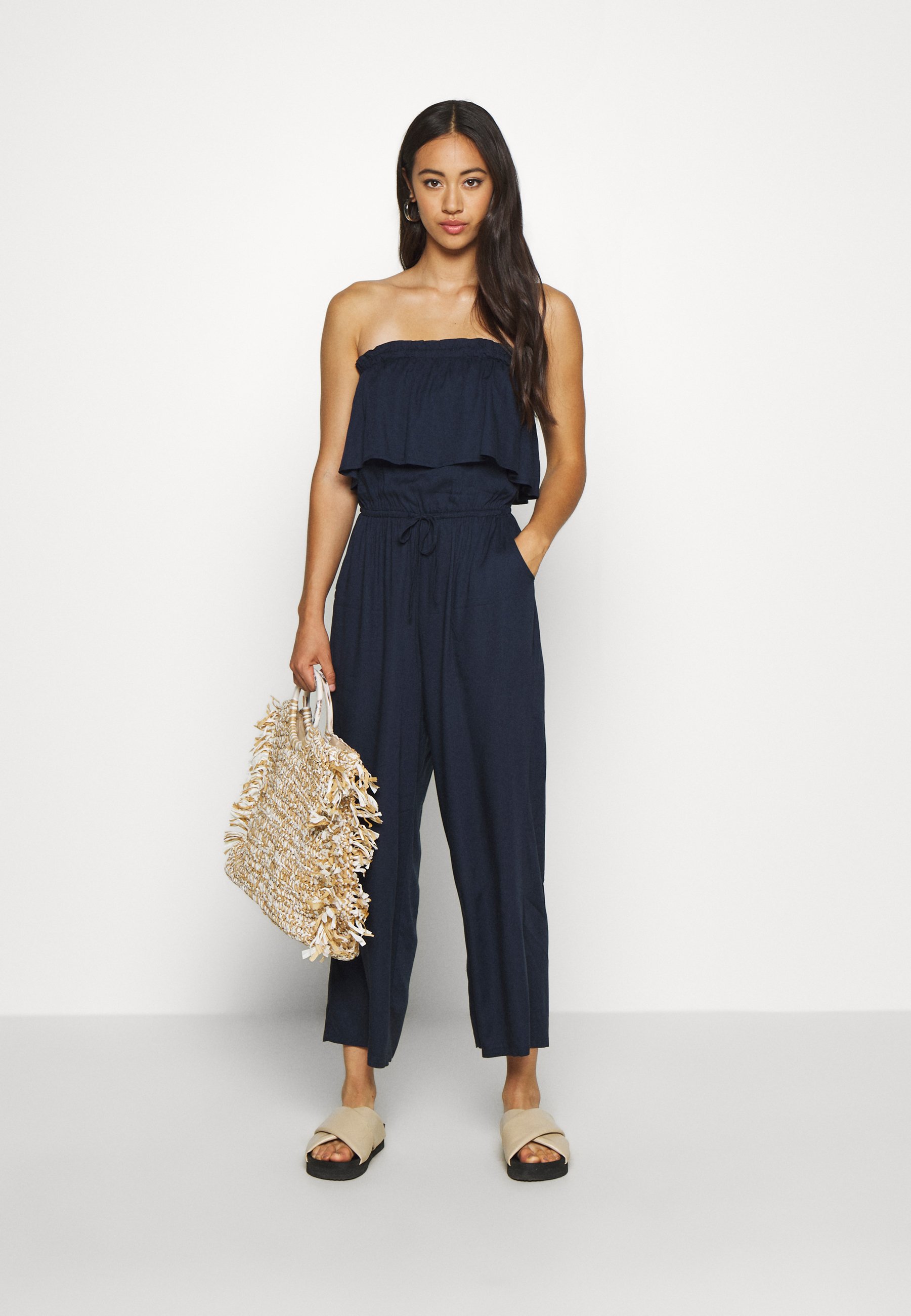 navy blue strapless jumpsuit