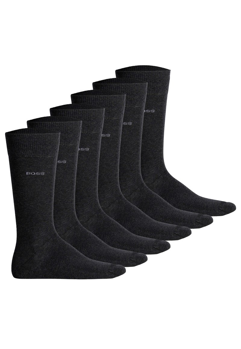 Sei paia di calzini grigio scuro, di spessore medio, con bordo a coste e un discreto logo sul lato. Tessuto liscio, punta senza cucitura.