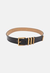 Juodas odinis diržas su tekstūruotu paviršiumi, turintis auksinės spalvos metalinę sagtį ir tris horizontalias detales. Vidinė dalis - lygi, tan spalvos oda.