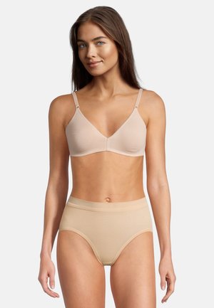 Beige sømløs bh med justerbare stropper og blød, glat tekstur, parret med matchende højtaljede trusser, også i beige.