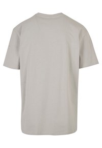 Light gray short-sleeve t-shirt with a crew neck. Made of smooth, lightweight fabric. Plain design, with no visible patterns or details.