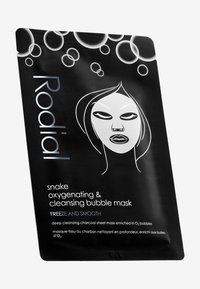 Black packaging featuring a minimalist white line drawing of a face and text reading "Rodial snake oxygenating & cleansing bubble mask." Bubbles pattern.