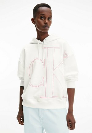Felpa bianca con cappuccio caratterizzata da un grande logo CK in rosa chiaro. Il design include una vestibilità comoda con polsini e orlo a costine.