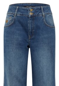 Blue denim jeans featuring a high waist, two gold buttons, and front pockets with a heart-shaped logo. The fabric has a smooth texture.