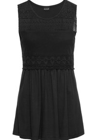 Svart ärmlös topp med en texturerad spetskjol, meshpaneler och en rynkad kjol. Tillverkad av mjukt tyg med en avslappnad passform.