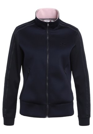 Tmavě modrá sportovní bunda na zip s žebrovanými rukávy, bočními kapsami, stojáčkem a jemným logem Adidas na hrudi.