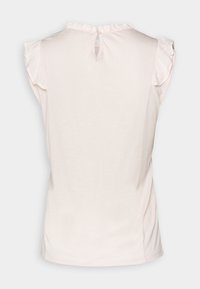 Haut rose clair à manches courtes avec des bords froncés, col rond et fermeture par trou de serrure dans le dos. Tissu doux avec une texture lisse.