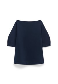 Marinblus off-shoulder med korta puffärmar. Mjuk bomullstyg, avslappnad passform och en böjd nederkant.