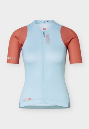 Maglia da ciclismo azzurro chiaro a maniche corte con maniche color ruggine, cerniera frontale intera e loghi del marchio discreti sul petto e sulla manica sinistra.