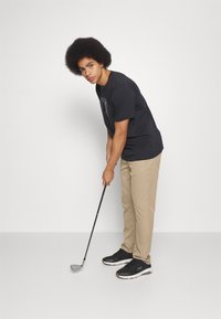 TravisMathew OPEN TO CLOSE - Trousers - khaki