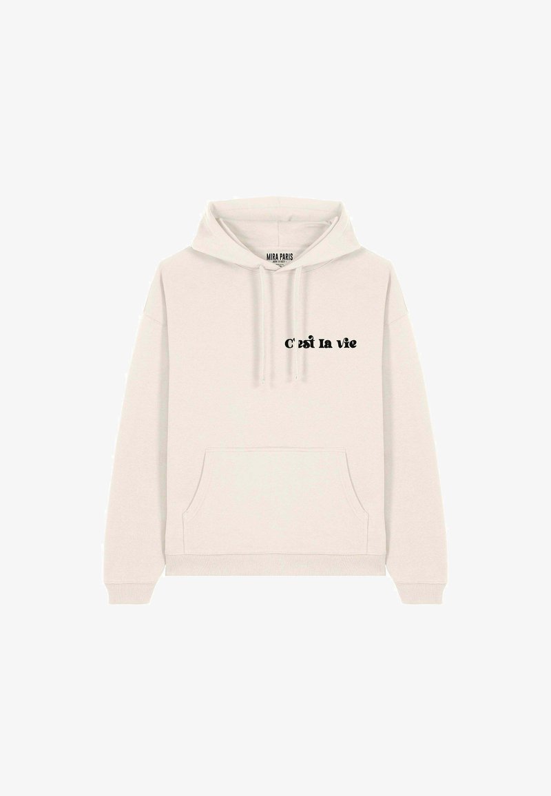Sudadera color crema con un bolsillo tipo canguro, capucha con cordón y "C'est La Vie" en texto negro en la parte delantera. Textura de tela suave.